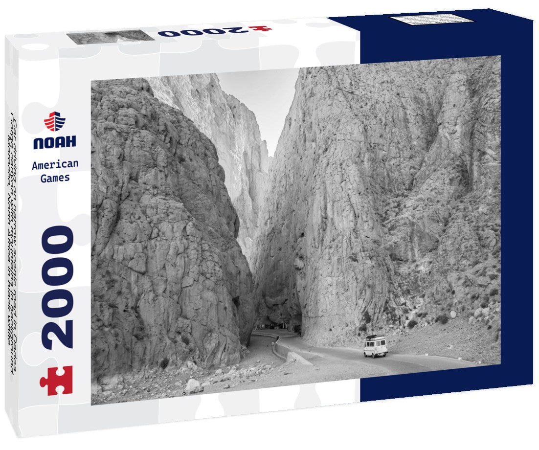 Noah Jigsaw Puzzle Car driving on narrow scenic road in Dades Gorge canyon with mountains in background, Morocco, North Africa in black white 2000 pieces