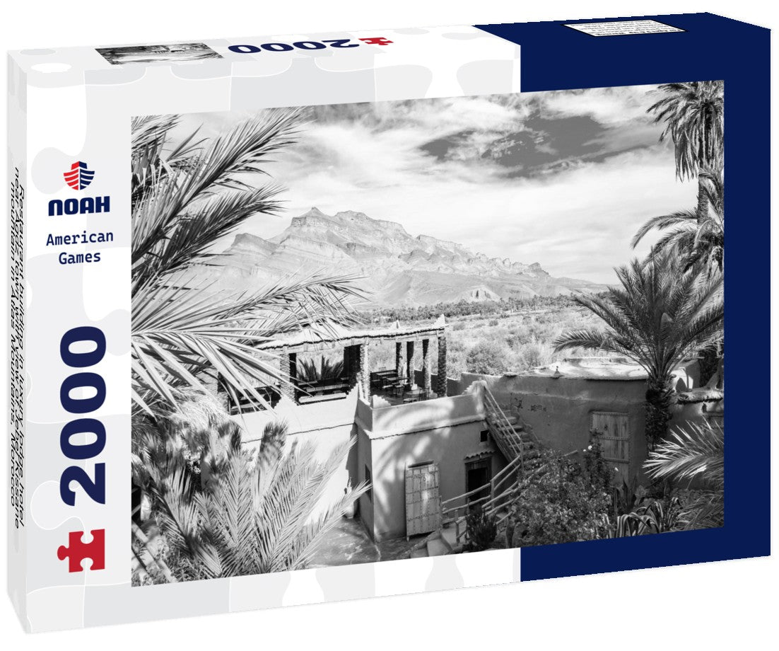 Noah Jigsaw Puzzle Restaurant building in luxury lodge hotel near Agdz town with view of Jebel Kissane mountain in Atlas Mountains, Morocco, North Africa in black white 2000 pieces