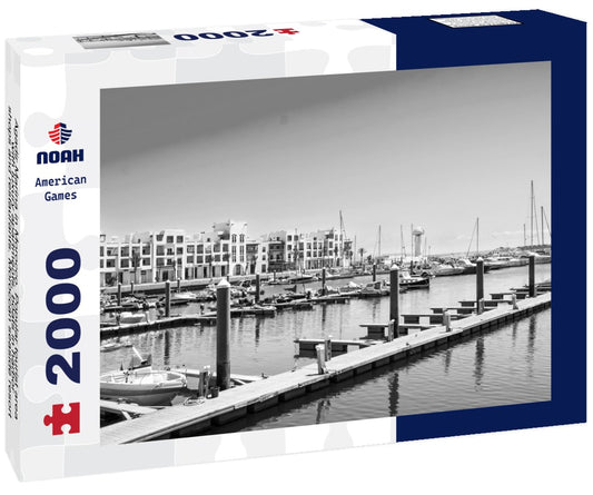 Noah Jigsaw Puzzle Agadir Marina in Morocco. Popular tourist area with luxury apartments, boats in harbor, shops and restaurants. Moroccan seaside resort on shore of Atlantic ocean in Africa in black white 2000 pieces