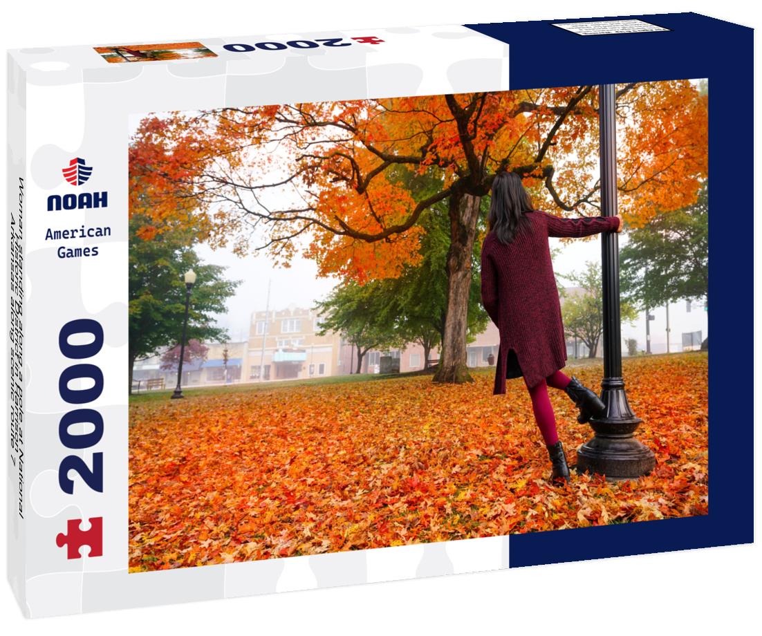 Noah Jigsaw Puzzle Woman standing along a pole at National Historic District in Harrison, Arkansas along scenic route 7 2000 pieces