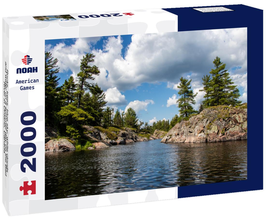 Noah Jigsaw Puzzle Rocks, trees, blue sky, white clouds and water on a summer day on the Bad River in Ontario, Canada 2000 pieces