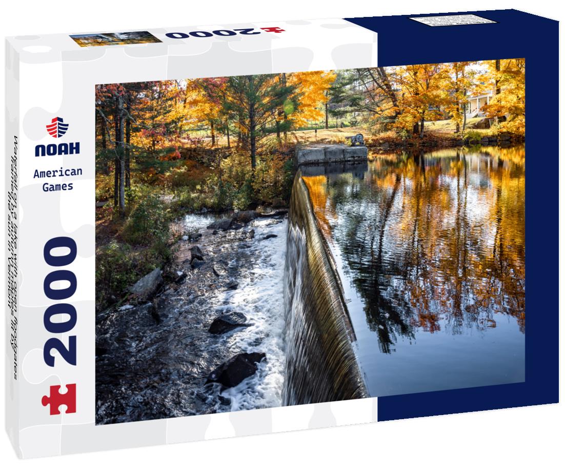Noah Jigsaw Puzzle Waterfall on a lake with open floodgates framed by autumn maples lit by the sun in Vermont 2000 pieces