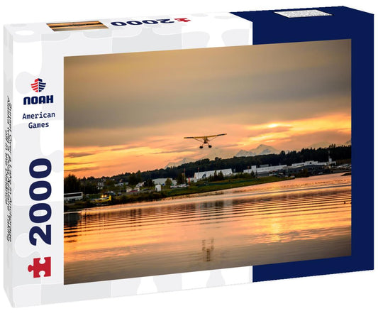Noah Jigsaw Puzzle Sunset Over a Lake in Anchorage Alaska with a Float Airplane Taking off in the Distance 2000 pieces