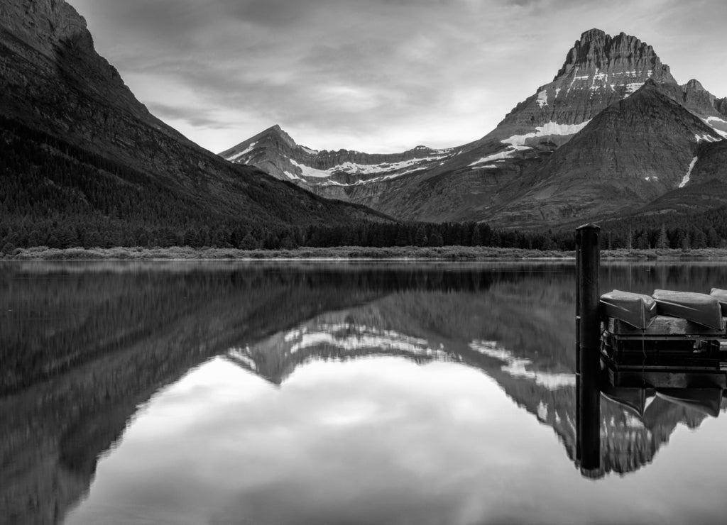 Alpenglow on Mount Grinnell at dawn seen at Many Glacier in Montana's Glacier National Park in black white