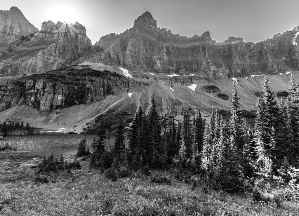 Turquoise color Iceberg Lake in Glacier National Park in Montana in summer in black white