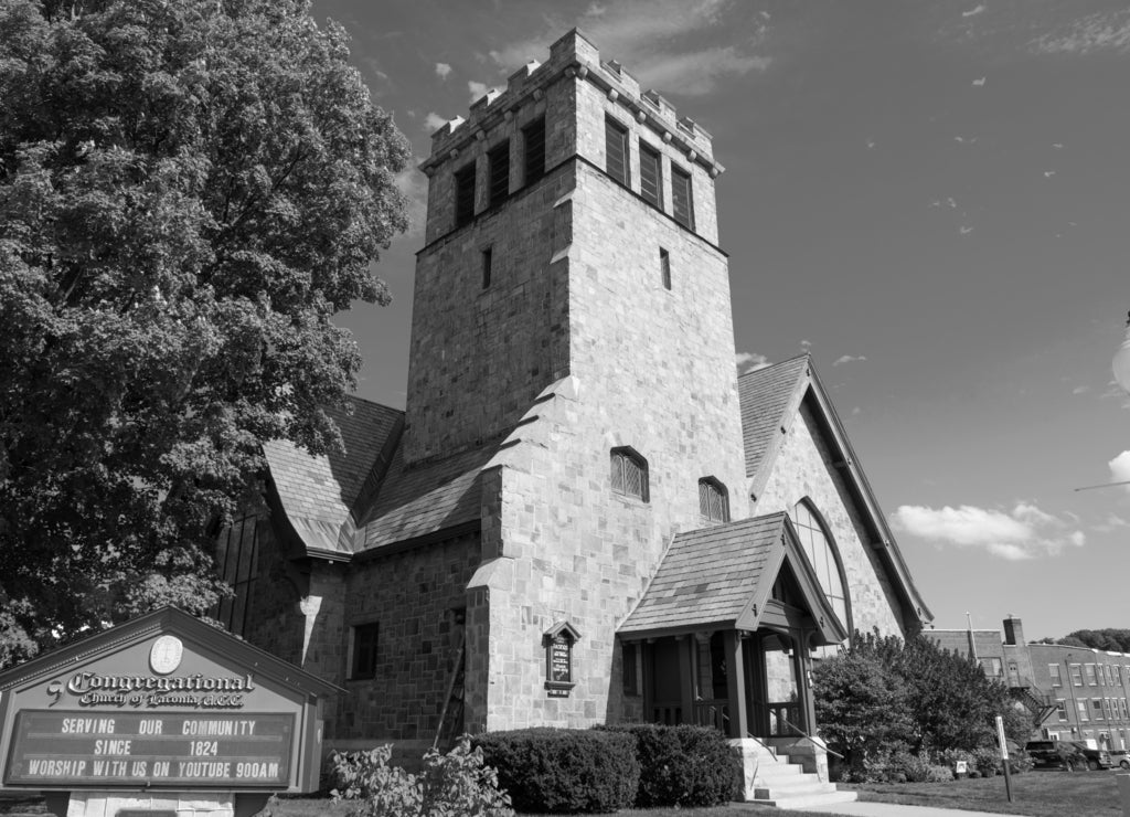 Laconia Congregational Church at 18 Veterans Square in city of Laconia, New Hampshire, USA in black white