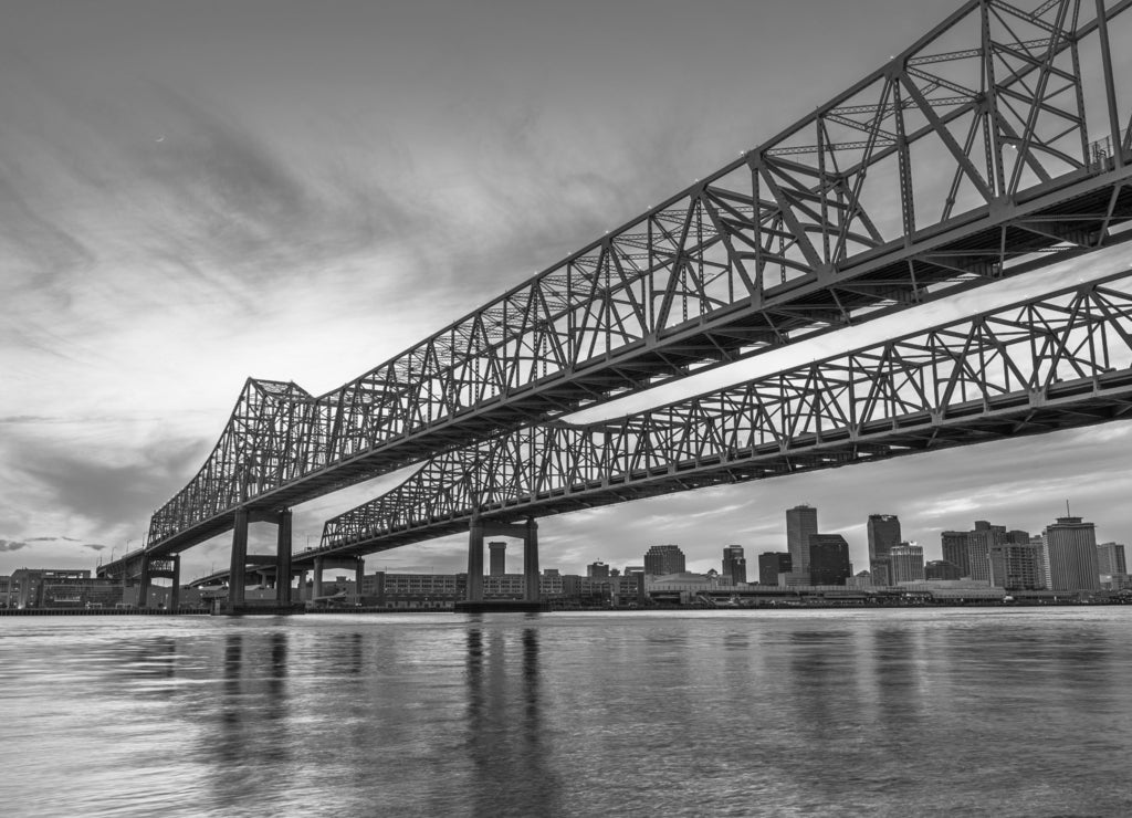 New Orleans, Louisiana, USA at Crescent City Connection Bridge over the Mississippi River in black white