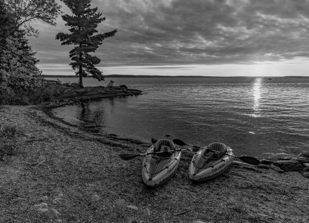 Kayaks in Lake Kabetogama of Voyageurs National Park Minnesota in black white