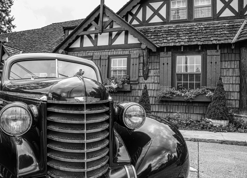 Late Thirties Antique Car in Front of Restaurant, Bigfork, Montana in black white