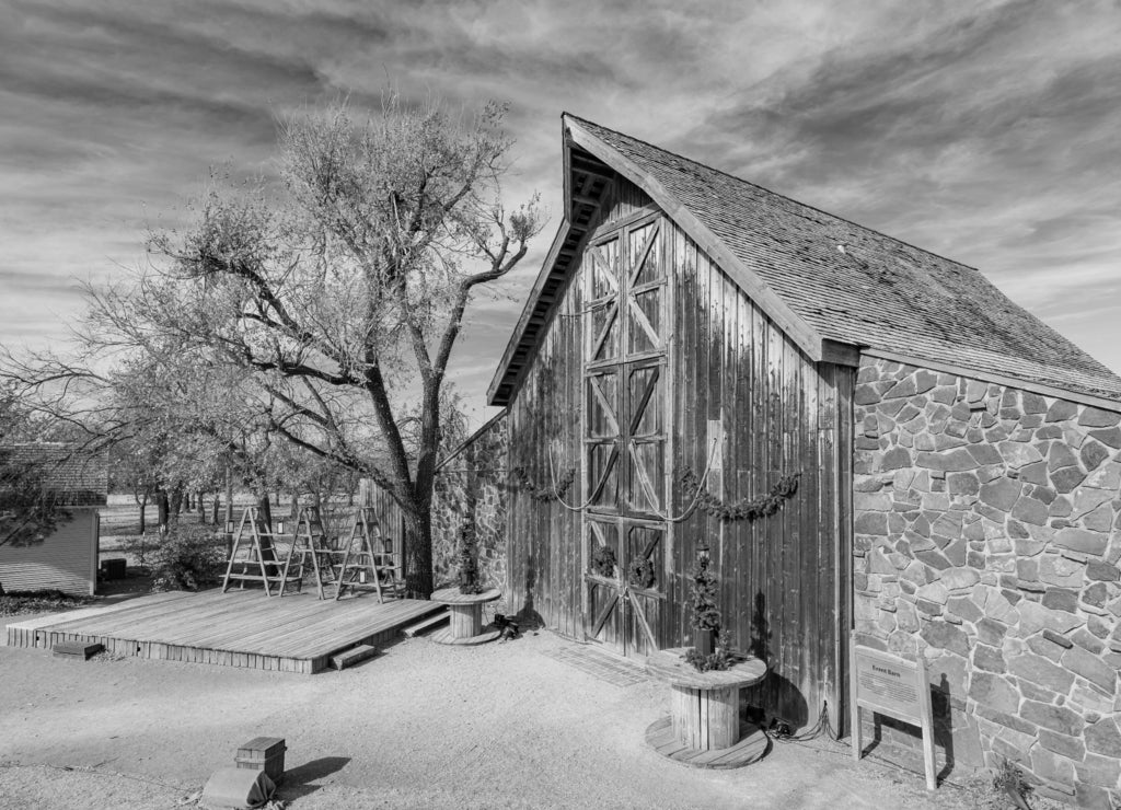 Barn door with christmas decoration in Harn Homestead landmark Oklahoma in black white