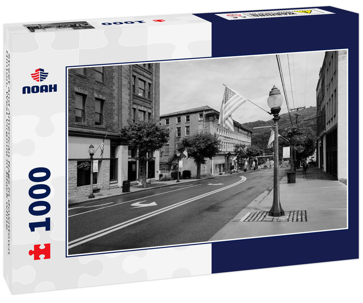 Street and American flags in downtown Hinton, West Virginia in black white