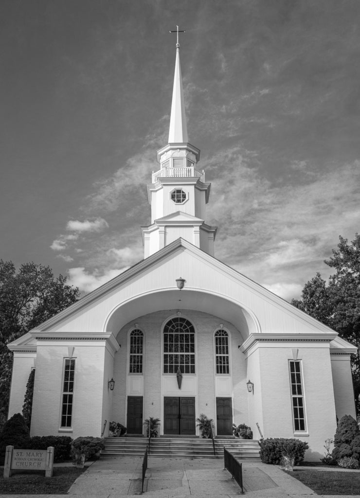 Catholic church building in Stonington, Connecticut in black white