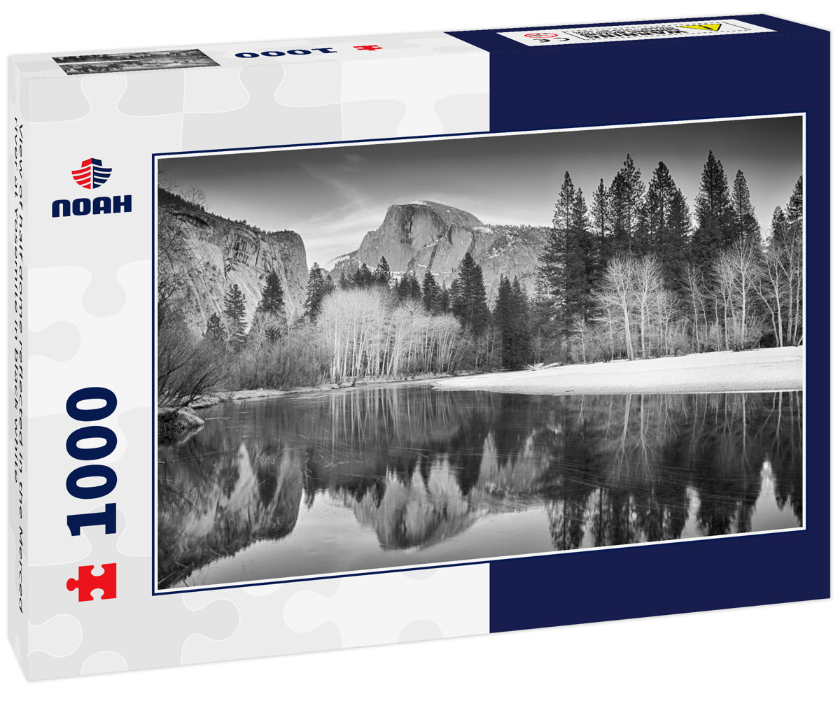 View of half dome reflected in the Merced river at Yosemite in black white