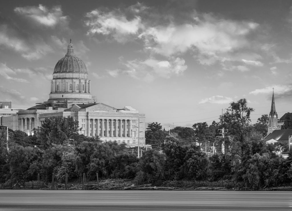 Jefferson City, Missouri, USA downtown view on the Missouri River with the State Capitol in black white