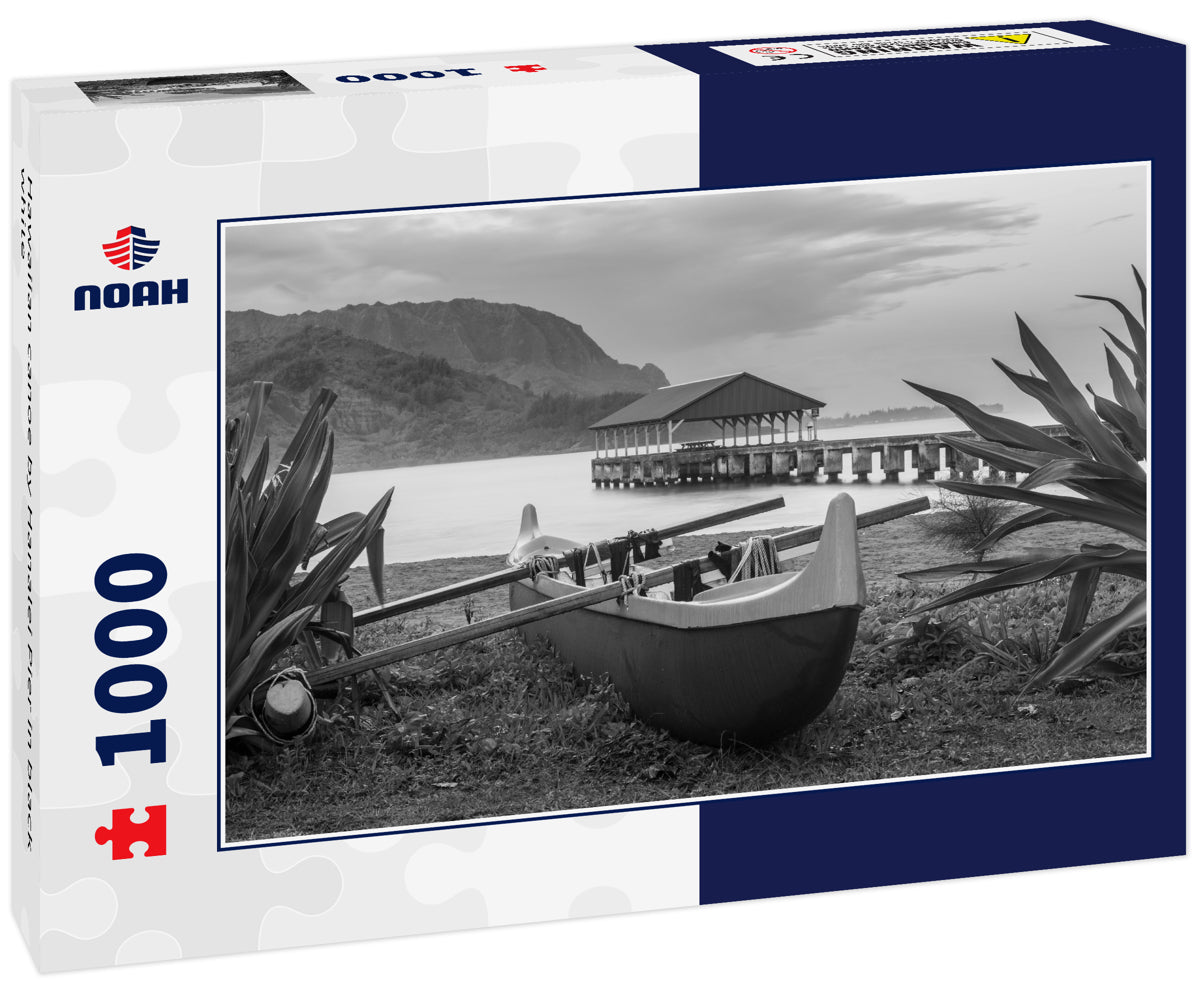 Hawaiian canoe by Hanalei Pier in black white