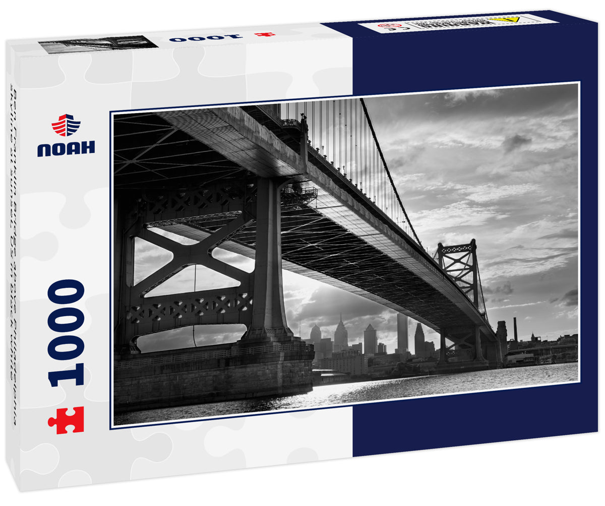 Ben Franklin Bridge above Philadelphia skyline at sunset, US in black white