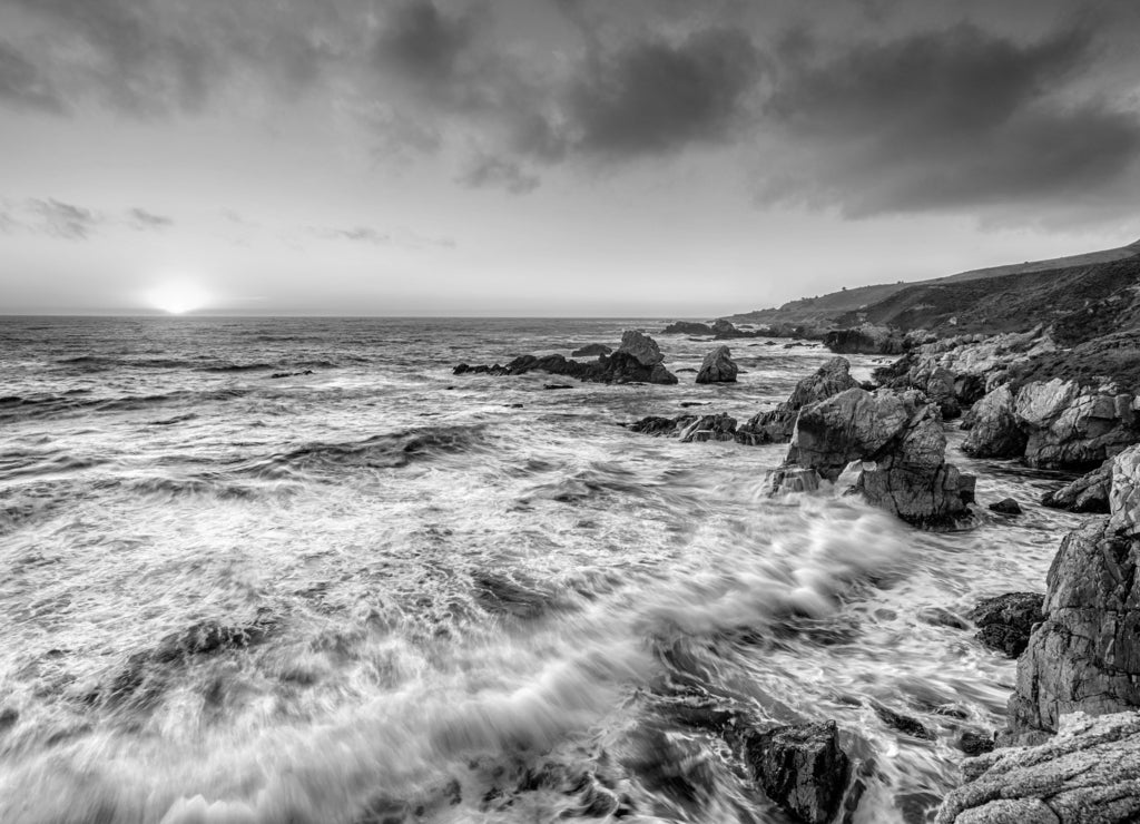 Beautiful sunset over California coast in black white