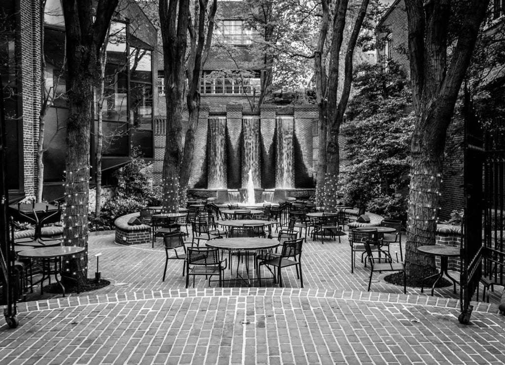 Fountains and outdoor dining area in downtown Lancaster, Pennsylvania in black white