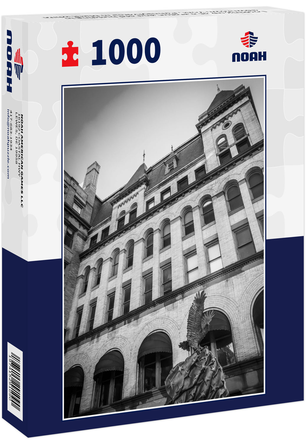 Looking up at a statue and old building in downtown York, Pennsylvania in black white