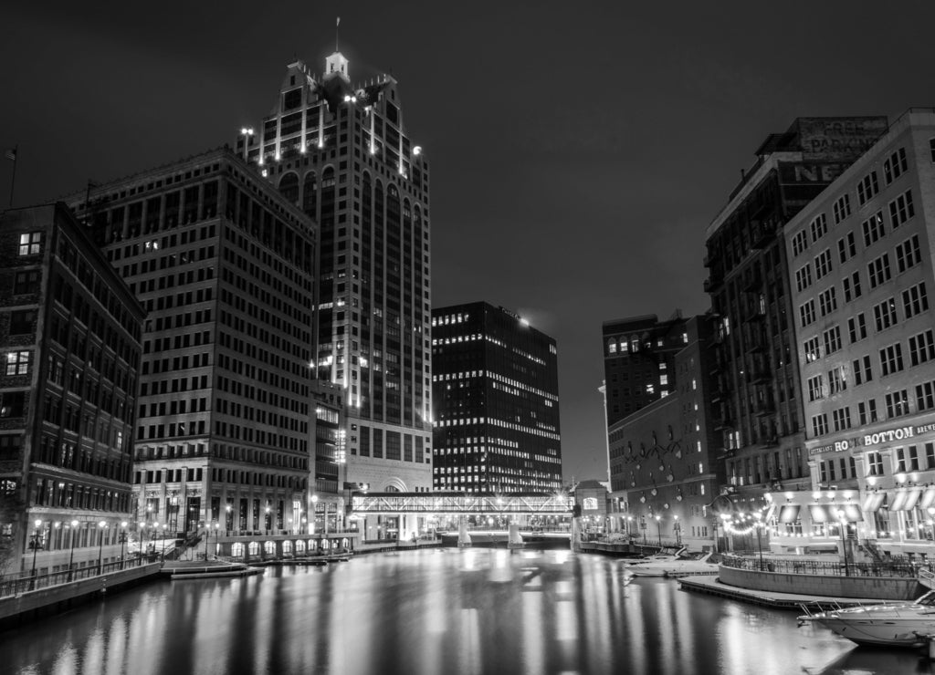 Buildings along the Milwaukee River at night, in Milwaukee, Wisconsin in black white