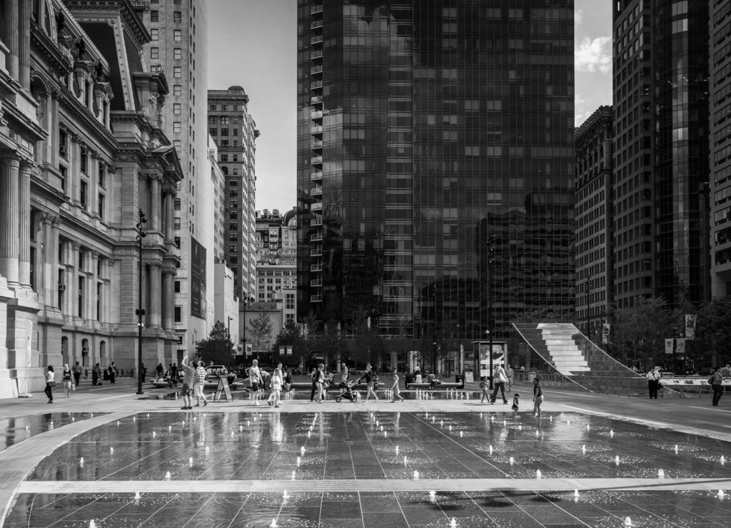 Fountains and buildings at Dilworth Park, in Philadelphia, Pennsylvania in black white