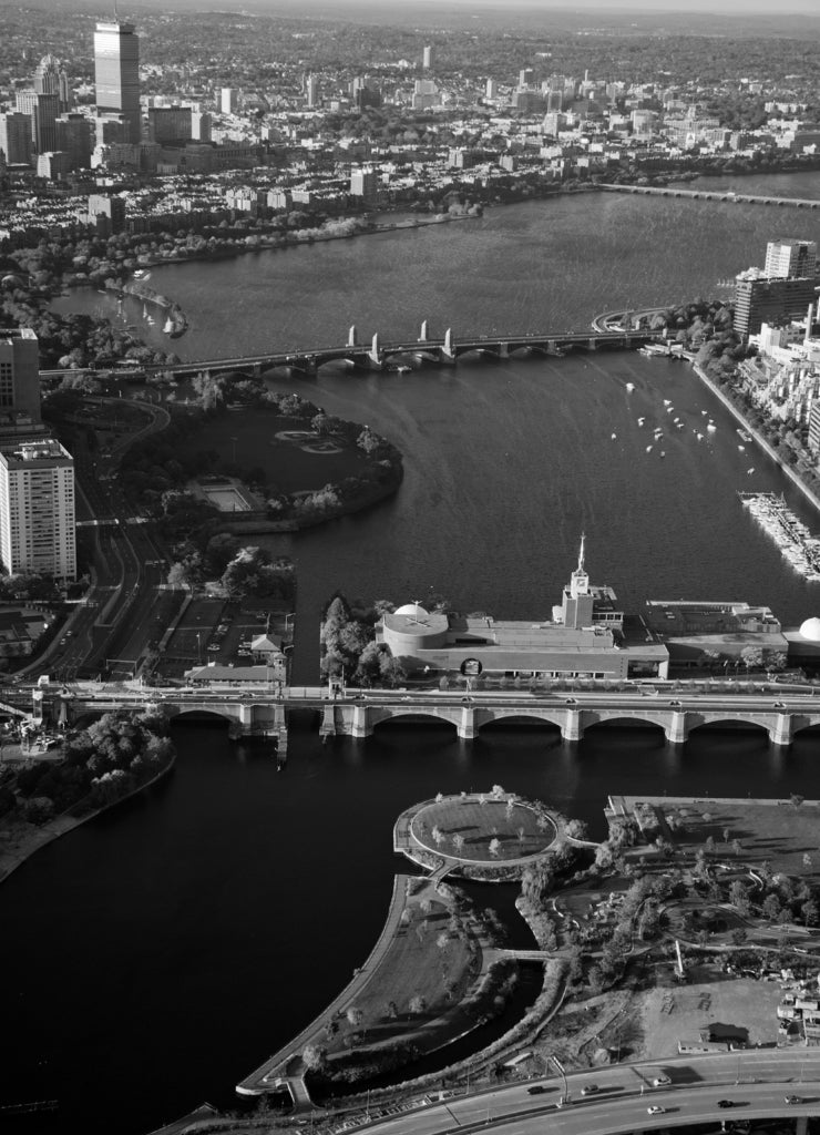 Aerial view of bridges crossing Charles River, Cambridge from Boston Massachusetts in black white