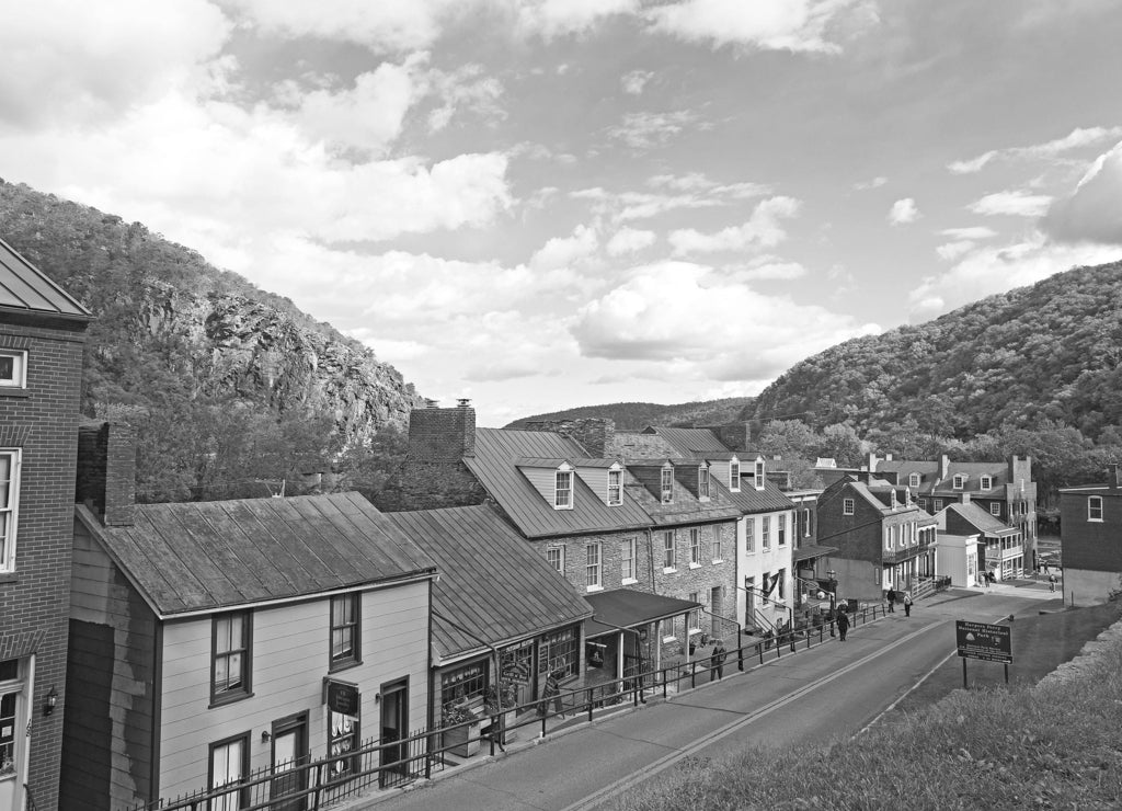 Harpers Ferry historic town in autumn and Blue Ridge Mountains. Houses on the street of historic town in Harpers Ferry National Historical Park, West Virginia, USA in black white