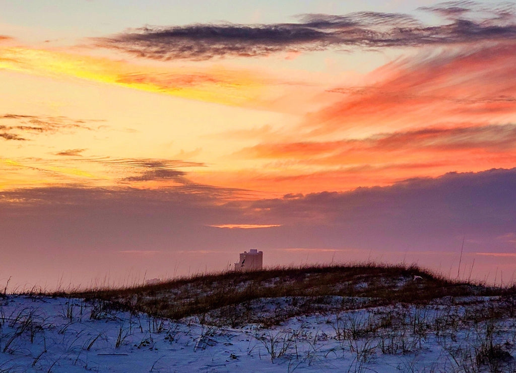 Sunset over the Dunes, walk on the beach at sunset, view of the setting sun over the sand dunes from the boardwalk, Alabama Point in Orange Beach, Alabama