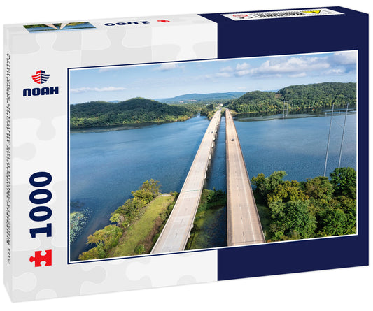 Ariel view of traffic on a bridge crossing the Tennessee River in Scottsboro Alabama