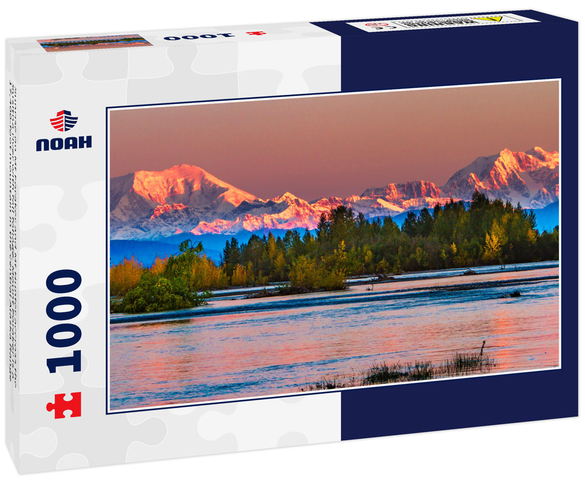 Sunrise on Mt Foraker and Mt Hunter accross the Susitna river with fall foliage. Mount Foraker is a 17,400-foot mountain in the central Alaska Range