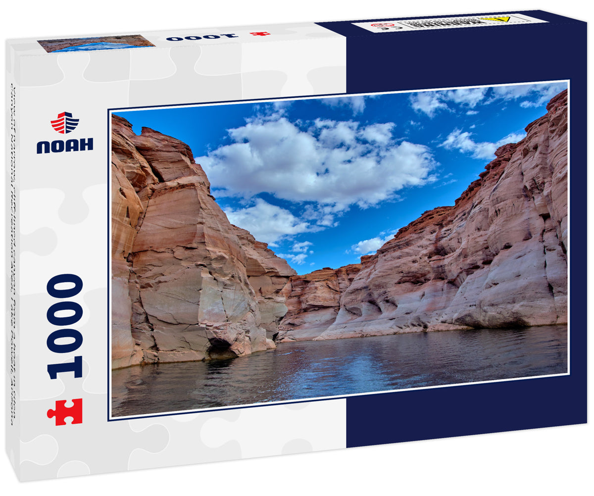 View of narrow, cliff-lined canyon from a boat in Glen Canyon National Recreation Area, Lake Powell, Arizona