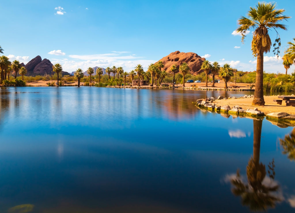 Serene, tranquil scenery of Papago park, one of the famous places in Phoenix Arizona. Bright, colorful and a beautiful day with blue sky and clear water surface