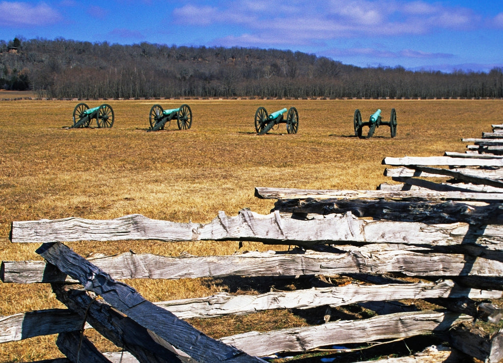 USA, Arkansas. Split-rail fence and Civil War cannons at Pea Ridge National Military Park