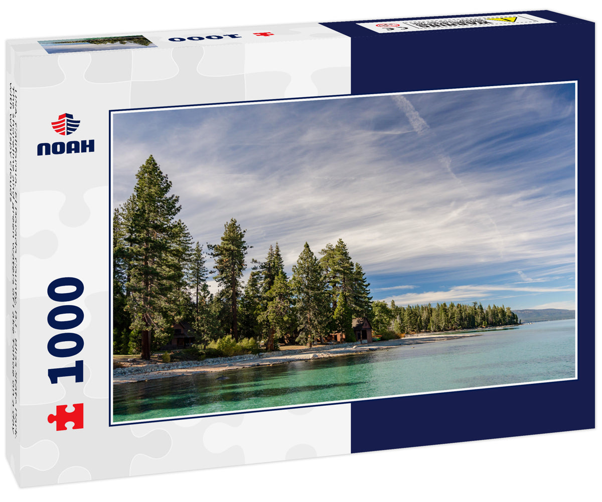 USA, California, El Dorado County, D.L. Bliss State Park. The shoreline and green waters of Lake Tahoe on a day with whispy clouds