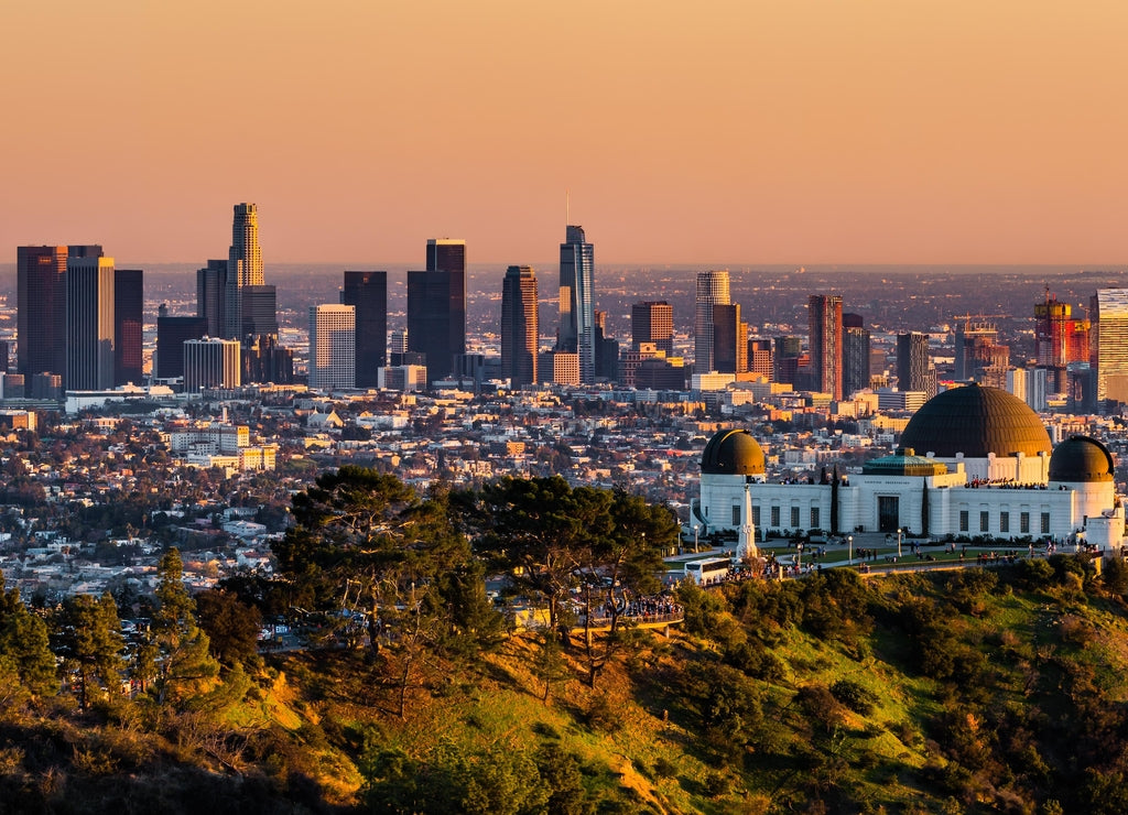 Los Angeles skyscrapers and Griffith Observatory at sunset