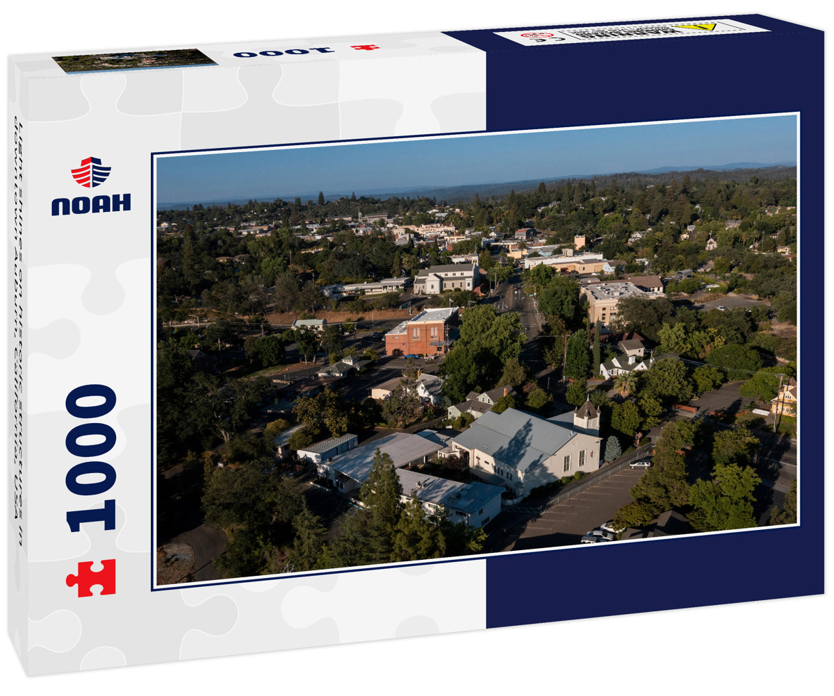 Light shines on historic structures in downtown Auburn, California, USA