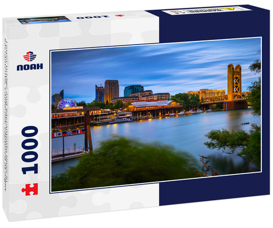 Tower Bridge and Sacramento River in Sacramento, California, captured at night
