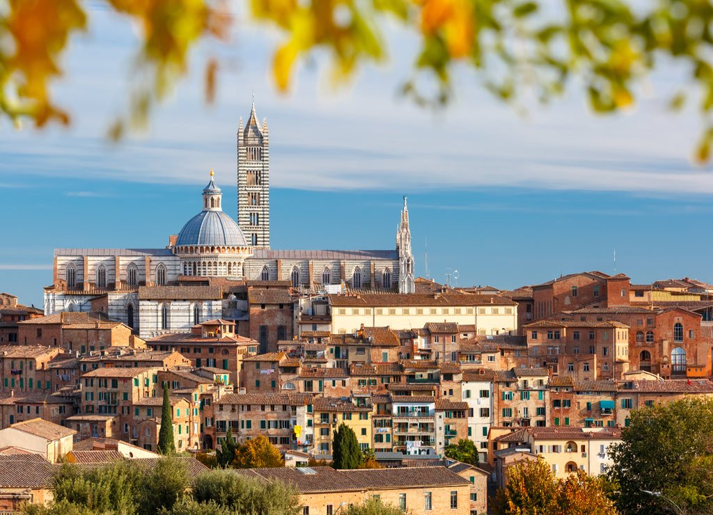 Beautiful view of Dome and campanile of Siena Cathedral, Duomo di Siena, and Old Town of medieval city of Siena