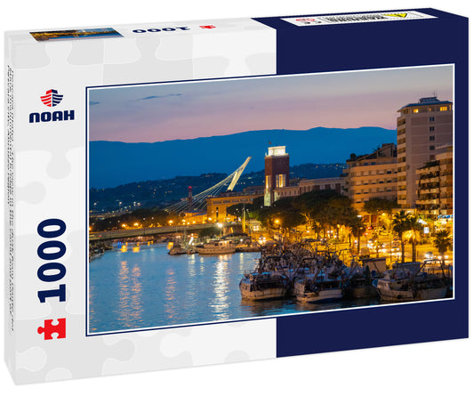 Pescara (Italy) - The view in the dusk from Ponte del Mare monumental bridge in the canal and port of Pescara city, Abruzzo region