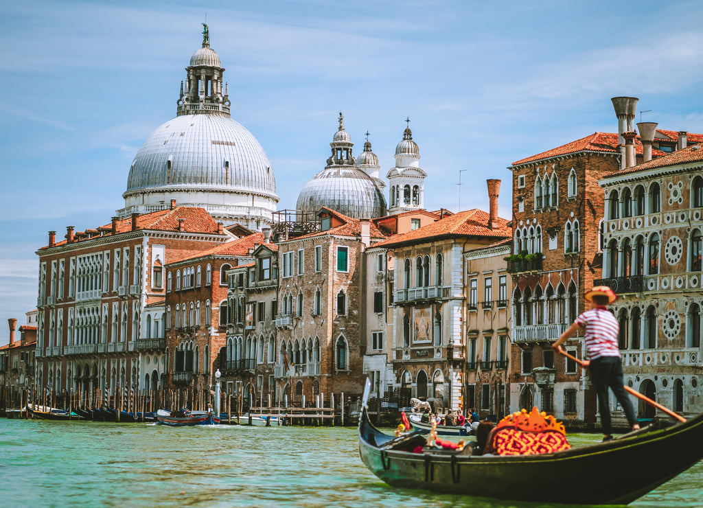 Grand Canal, Traditional Gondola and Basilica Santa Maria della Salute in background, Venice, Italy