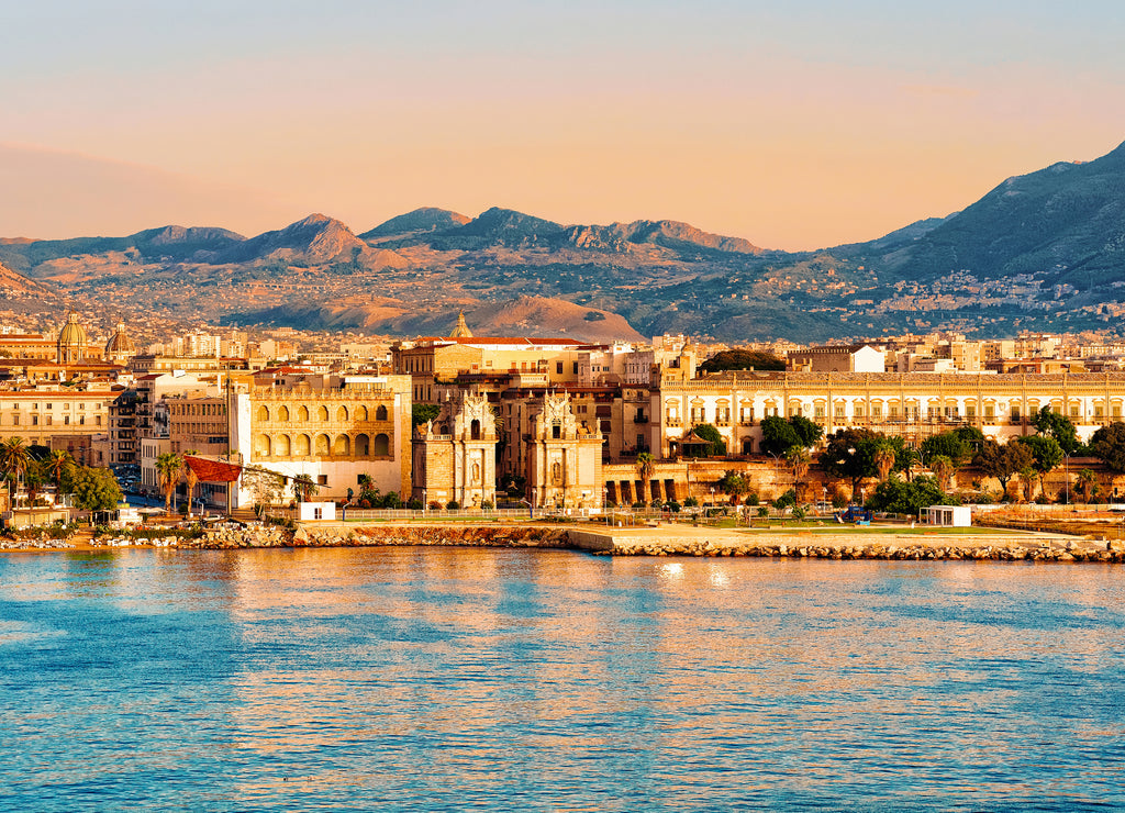 Sunrise at Mediterranian sea Sicily Palermo old city reflex