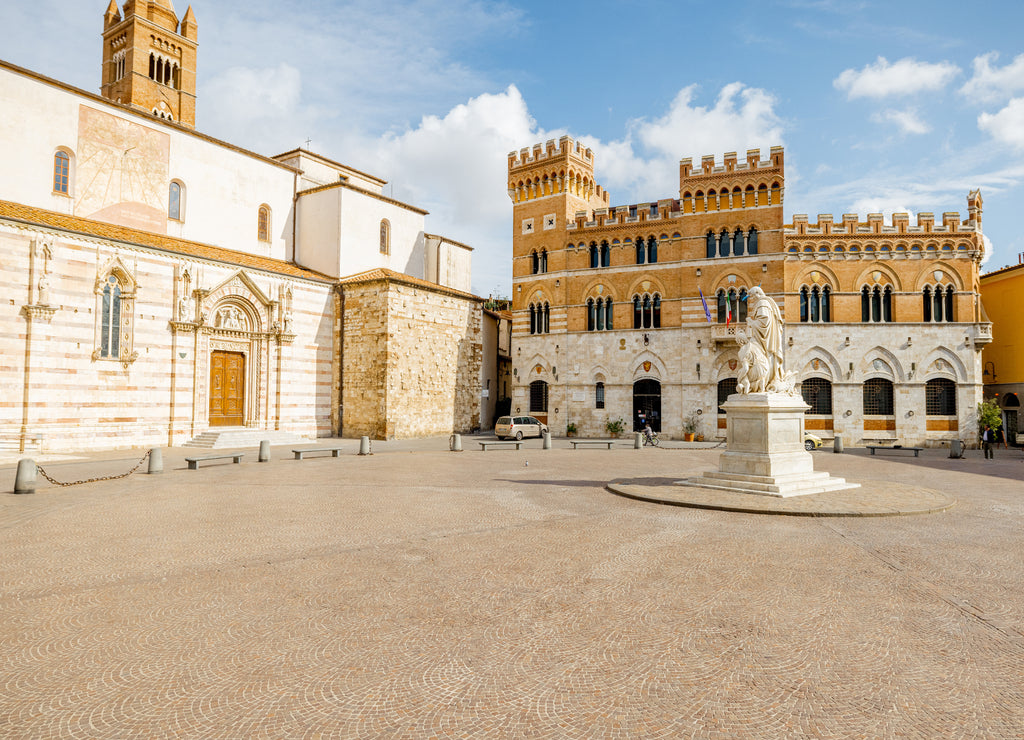 Morning view on Piazza Dante, central square in Grosseto town on sunny day. This city is the center of Maremma region
