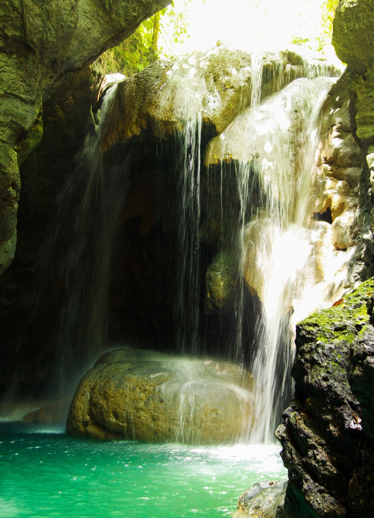 Isolated Somerset waterfalls in jungle and cave near Portland, Jamaica