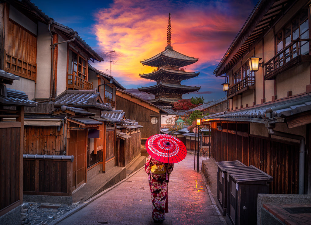 Asian women wearing traditional japanese kimono among at Yasaka Pagoda and Sannen Zaka Street in Kyoto, Japan