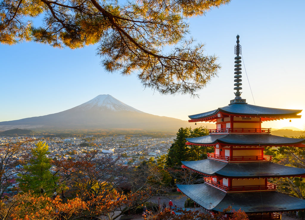 View of Red pagoda Chureito and Mount Fuji at sunset