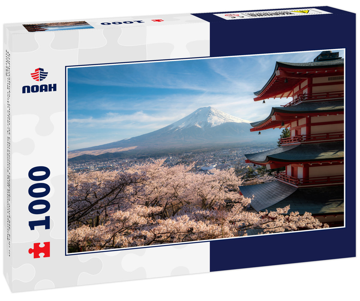 Fujiyoshida, Japan at Chureito Pagoda and Mt. Fuji in the spring with cherry blossoms full bloom during sunrise