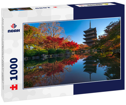 The wooden pagoda of Toji Temple with beautiful maple leaves, Kyoto, Japan