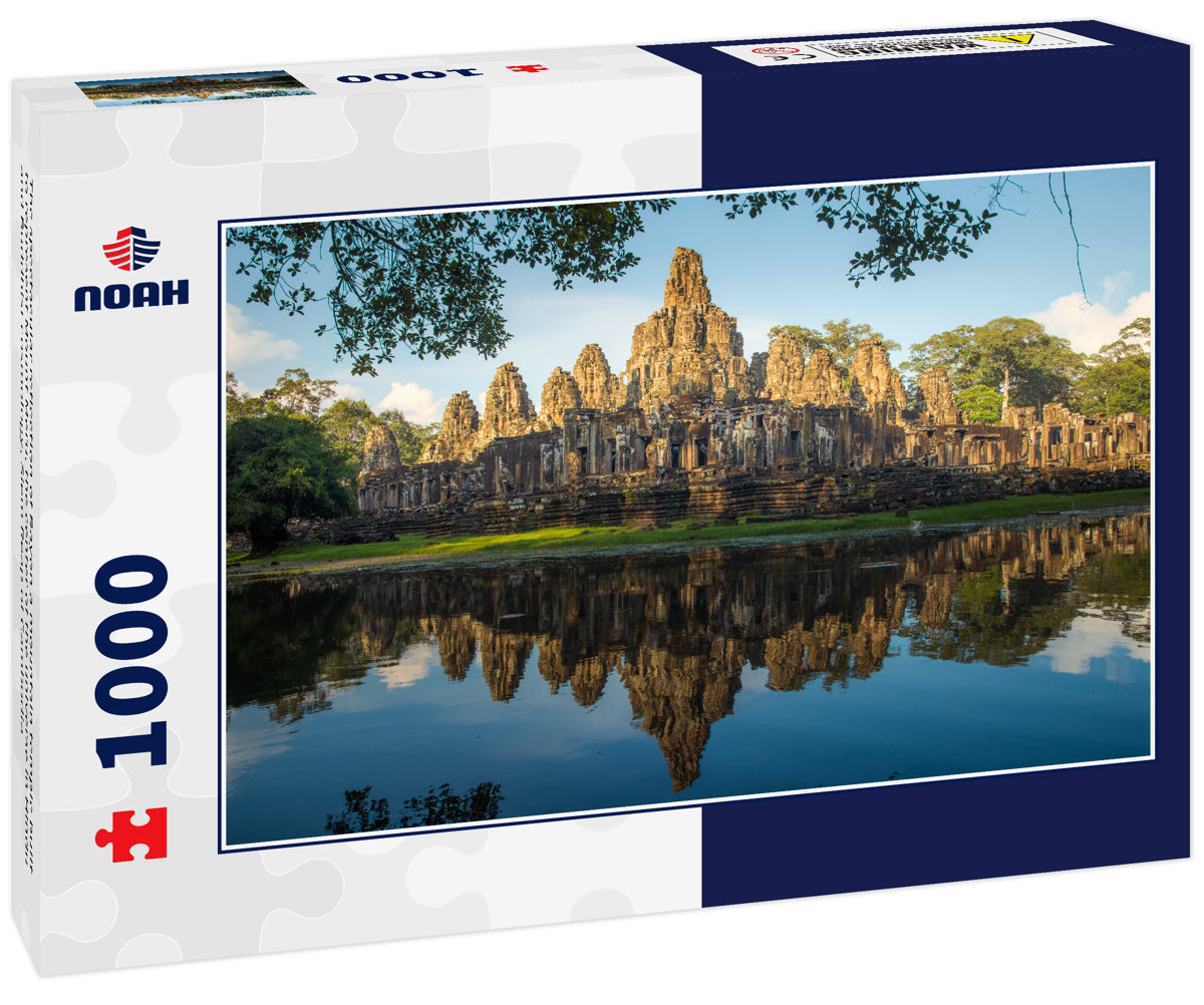 The spectacular reflection of Bayon a mountain temple built to represent Mount Meru, the center of the universe in Hindu and Buddhist cosmology, Siem Reap of Cambodia