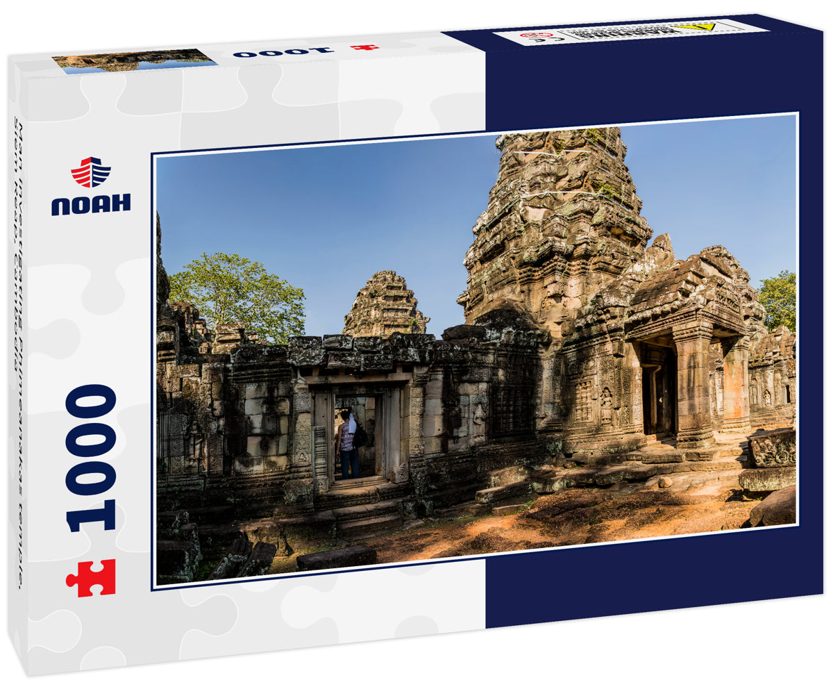 Man investigating Phimeanakas temple, Siem Reap, Cambodia