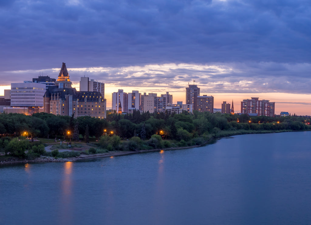 Saskatoon skyline at night along the Saskatchewan River